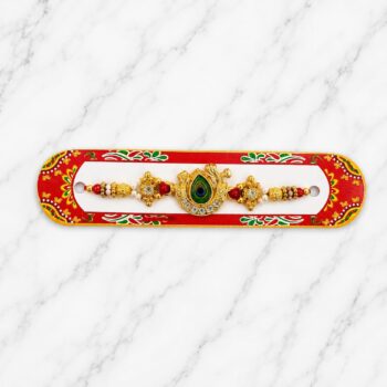 ময়ুরপালক স্টোনের রাখি - peacock feather stone rakhi